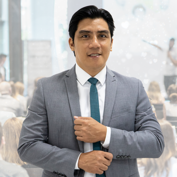 "Sales Director Ace Gem Guevara posing for a corporate photo with the JBC team"