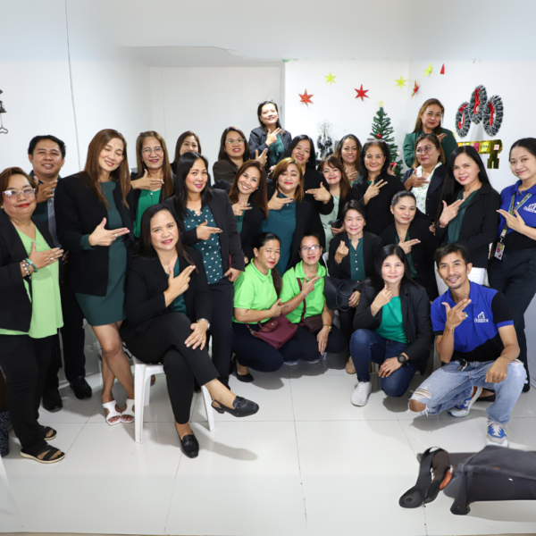 "UM Crisanta Villanueva with Sales Director Maria Lourdes and Unit Manager Irene, standing together in a group shot, all smiling warmly."